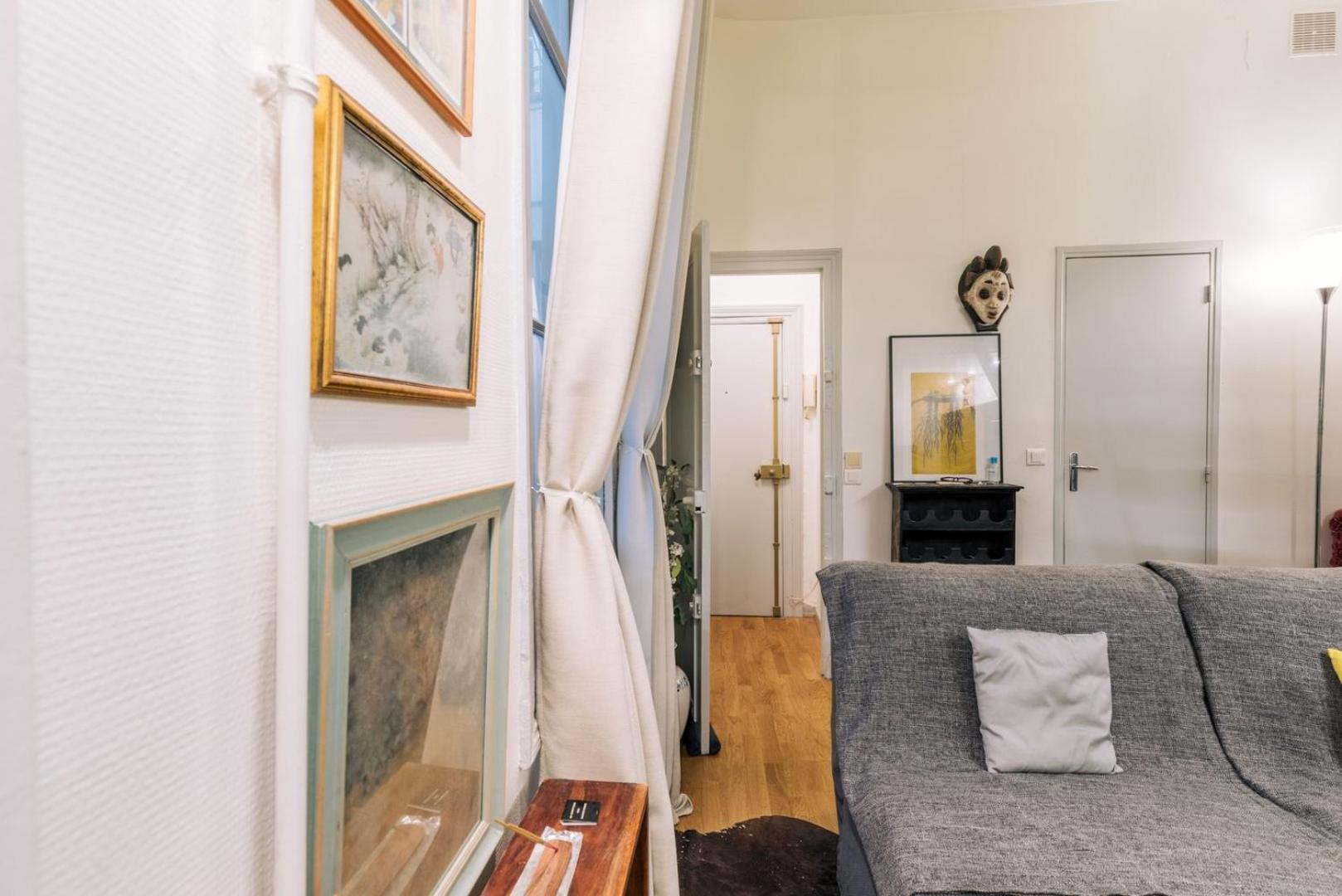 Guestready - Cosy Mezzanine In Appartement Parijs