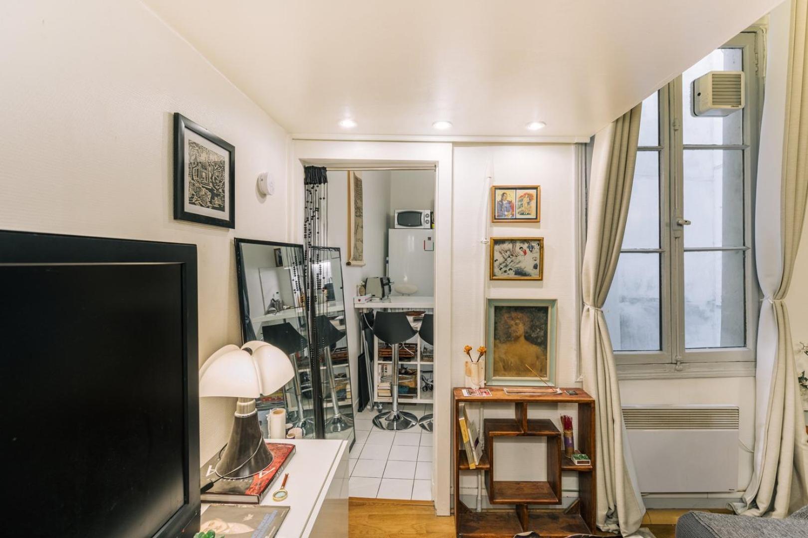 Guestready - Cosy Mezzanine In Appartement Parijs